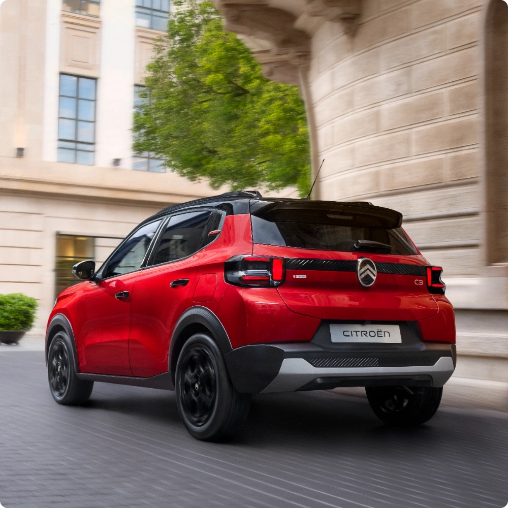Rear three‑quarter view of Citroën C3 Hybrid compact SUV illustrating smart electric‑assisted technology for efficient, modern and affordable mobility.