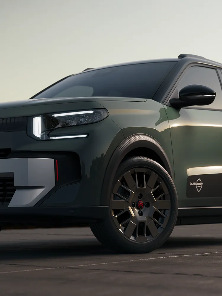 Primer plano frontal del Citroën ëC3 Outdoor, con llanta de aleación y firma luminosa LED que realzan el Advanced Comfort de este SUV compacto