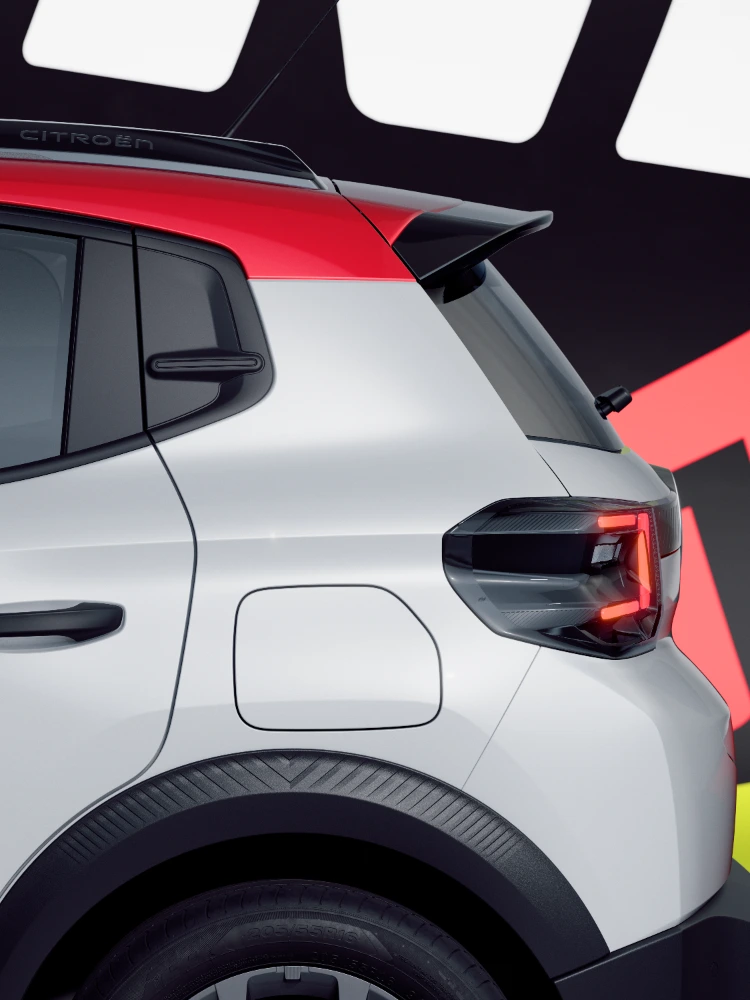 Vista detalle trasero del Citroën ë-C3 TONIC edición limitada, coche eléctrico urbano con piloto trasero y estilismo posterior, alternativa electrica moderna