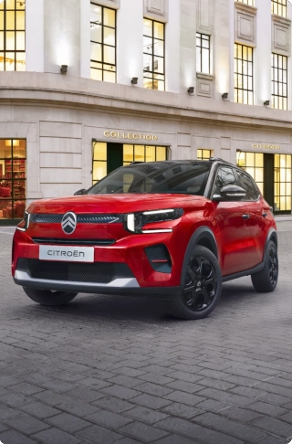 three quarter front driving view of Citroën C3 compact SUV highlighting sculpted bonnet and modern lighting for confident, efficient and affordable mobility.
