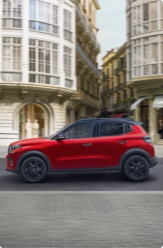 side driving view of Citroën C3 compact SUV showcasing modern urban design for smooth, confident and affordable mobility.