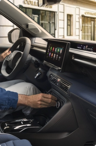Interior view of Citroën C3 compact SUV highlighting large touchscreen and smartphone connectivity for intuitive, modern and affordable everyday driving.
