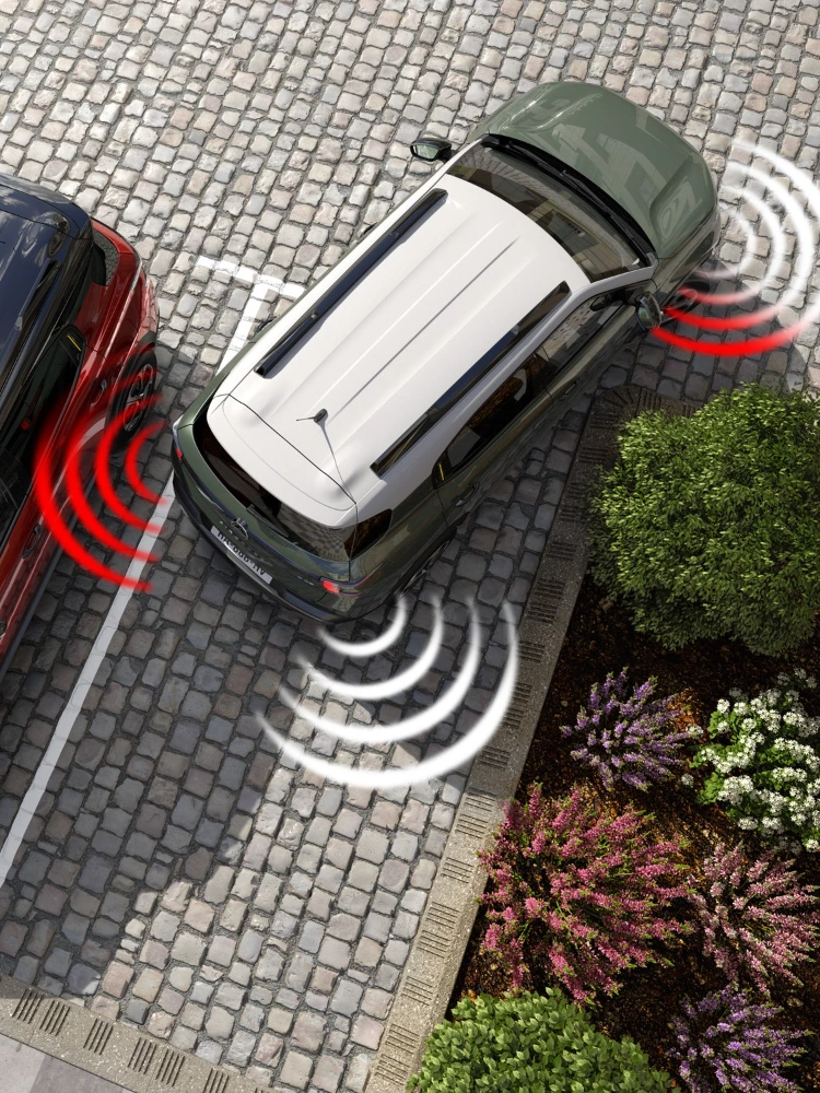 Vista cenital de aparcamiento del Citroën ë-C3 Aircross SUV ilustrando detección de obstáculos para maniobras diarias más seguras, fáciles y asequibles.
