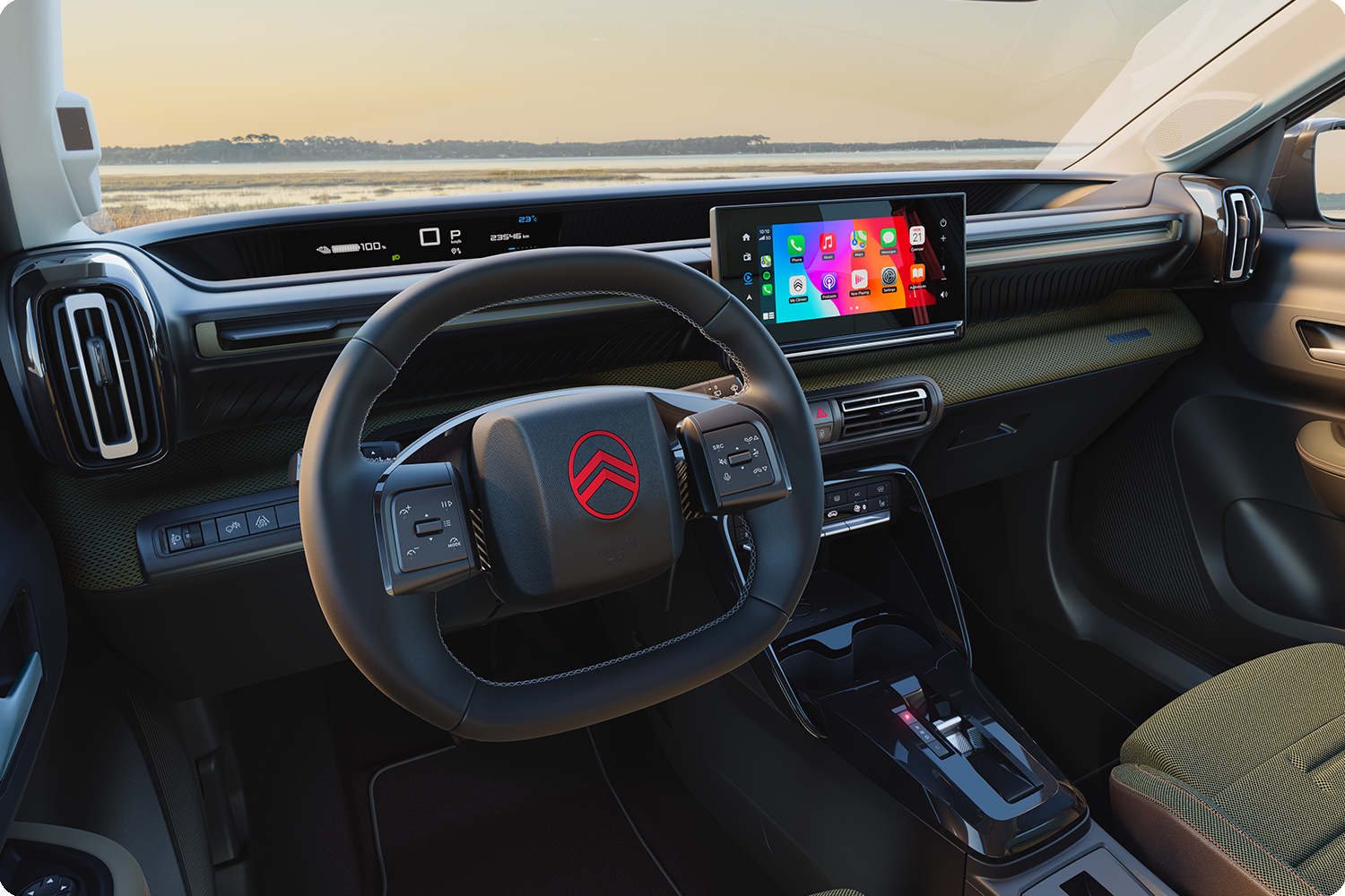 Primer plano del salpicadero del Citroën C3 Outdoor, cuya pantalla táctil muestra la conectividad Advanced Comfort para tus viajes en SUV compacto.