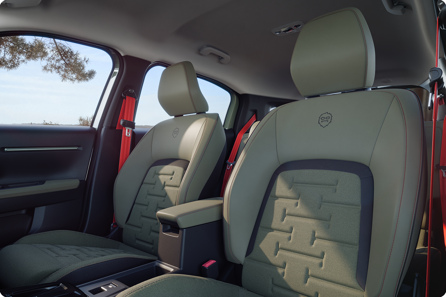 Primer plano de los asientos traseros del Citroën C3 Aircross Outdoor con cinturones de seguridad rojos, comodidad, amplitud y un diseño renovado para todos.